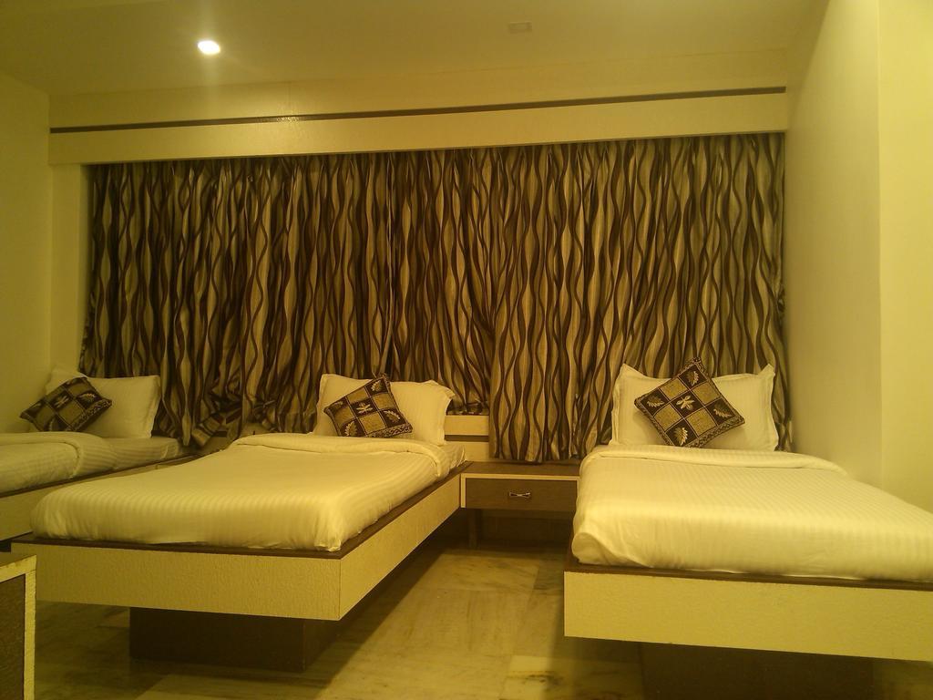 Hotel Oc Residency Bombaim Quarto foto