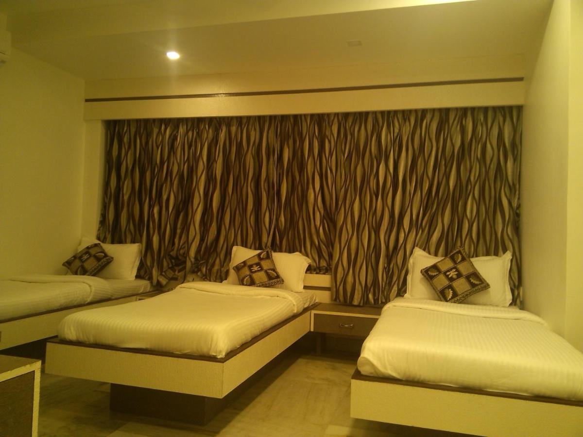 Hotel Oc Residency Bombaim Quarto foto